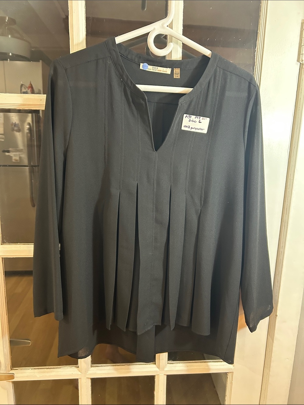 A51.    Black Pleated V-Neck Long Sleeve Women's Top